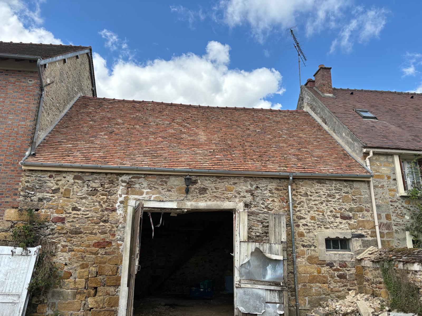 Remplacement de tuiles mécaniques sur pavillon à Fontainebleau (77)